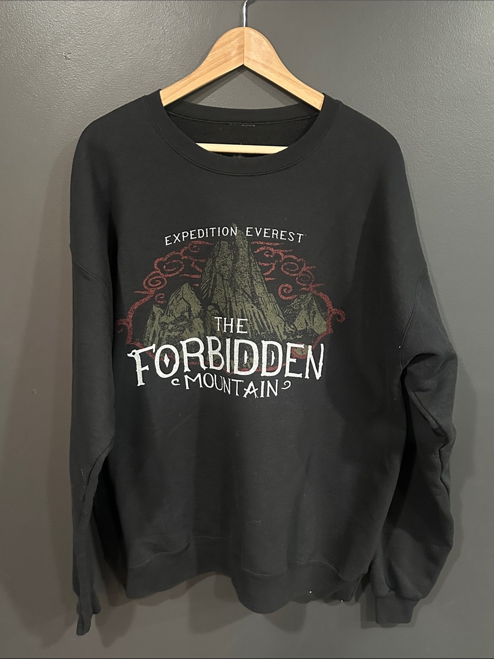 Disney Black Forbidden Mountain Crewneck Sweater with Red and Green Graphic